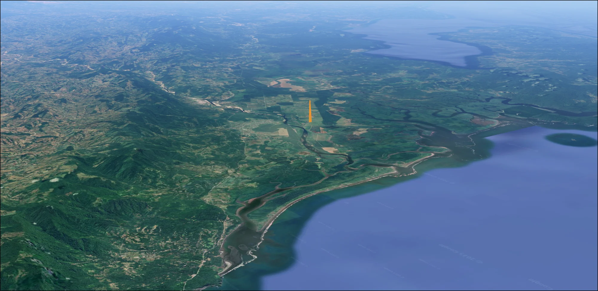 Google Earth view showing the proposed Southern Zone Airport location between Ojochal and the Térraba-Sierpe wetlands