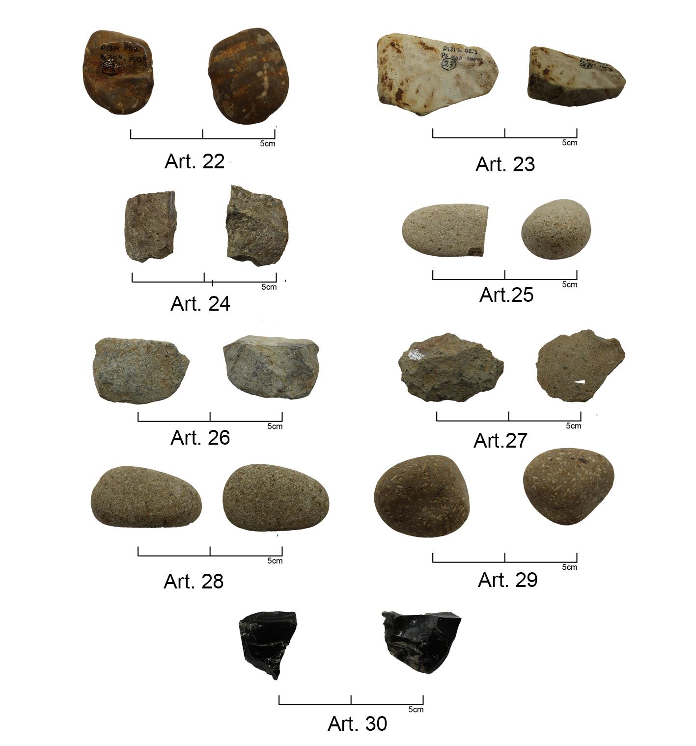 Lithic artifacts including grinding stones, manos, and obsidian fragments