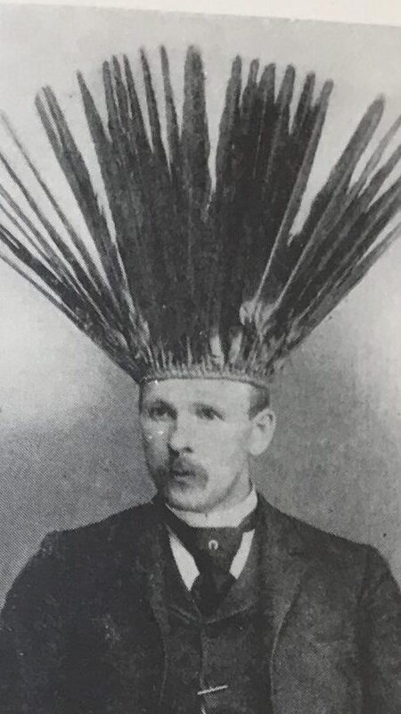 Henry Hurd Rusby wearing an Araüna Indian headdress