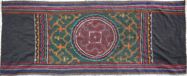 Shipibo textile with geometric kené patterns
